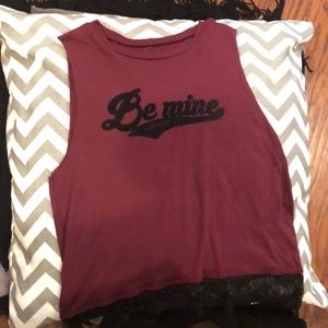 A maroon top with lace on the bottom!